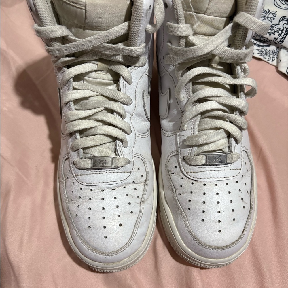 White High-Top Nike Sneakers
